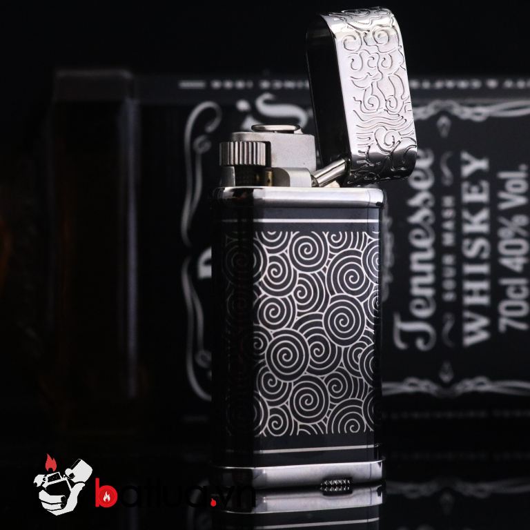 Bật lửa Cartier đen hình rồng bạc